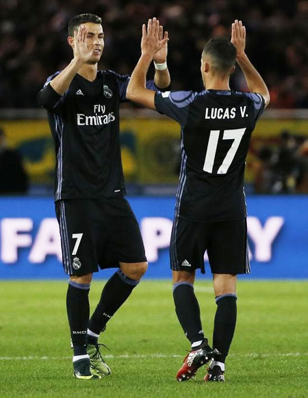 Real Madrid's Cristiano Ronaldo celebrates with teammate Lucas Vazquez during their FIFA Club World Cup Semi Final at the International Stadium in Yokohama, Japan on Thursday