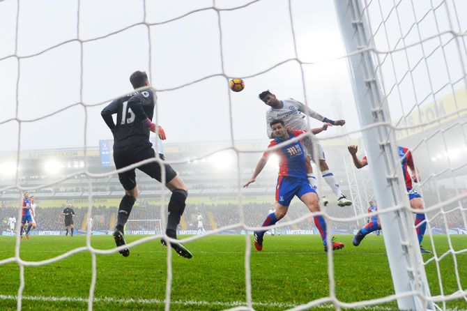 Chelsea's Diego Costa (right) heads the goal against Crystal Palace during their Premier League match at Selhurst Park in London on Saturday