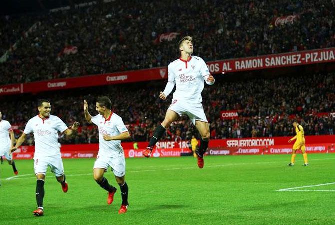 Sevilla's Luciano Vietto celebrates after scoring against Malaga during their La Liga match at the Ramon Sanchez Pizjuan Stadium, Seville, on Saturday