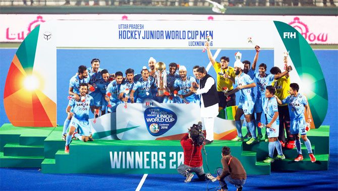 The triumphant Indian junior hockey team with the trophy after winning the Junior Hockey World Cup in Lucknow on Sunday