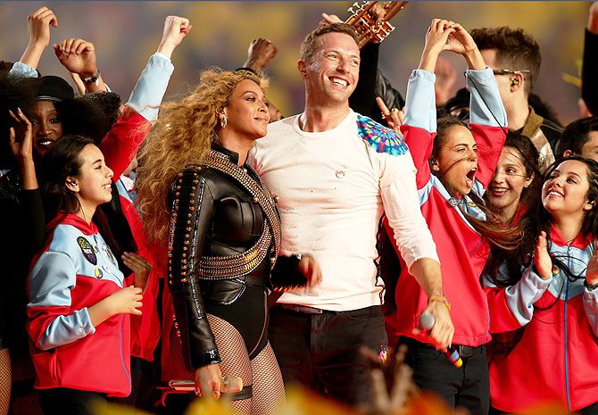 Beyonce (left) and Chris Martin of Coldplay perform onstage during the Pepsi Super Bowl 50 Halftime Show at Levi's Stadium in Santa Clara, California, on Sunday