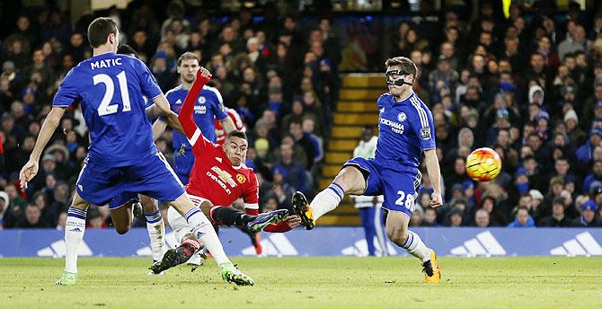 Manchester United's Jesse Lingard scores their first goal