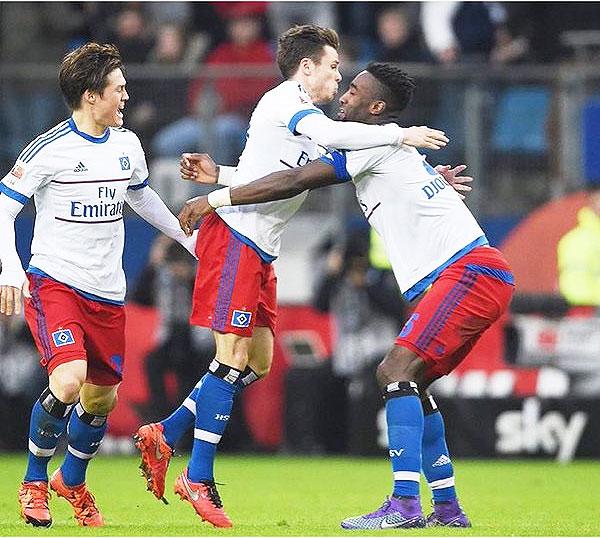 Hamburg players celebrate a goal 