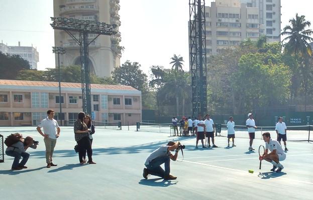 Tim Henman strikes a pose for the photographers 