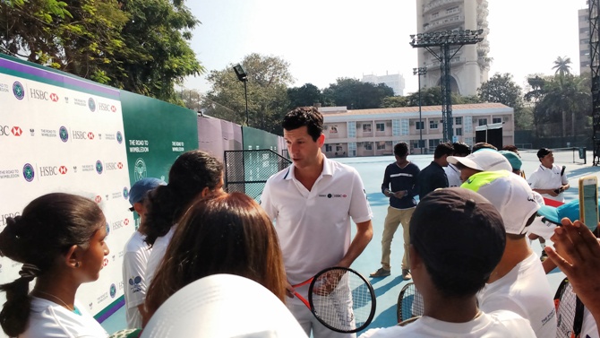 Tim Henman answers queries at the clinic