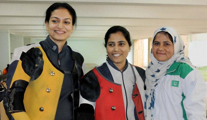 Gold medal winner Kuheli Gangulee of India (centre), with compatriot and silver medalist Anuja Jung 
