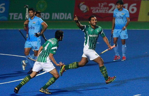 Pakistan's Awais Ur Rehman (second right) celebrates after scoring against India 