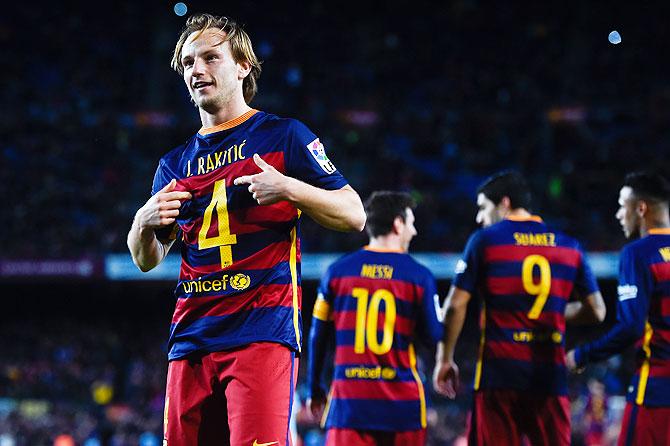 FC Barcelona's Ivan Rakitic celebrates after scoring his team's fifth goal against Celta Vigo