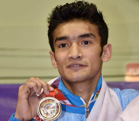 Boxer Shiva Thapa poses for photographs 