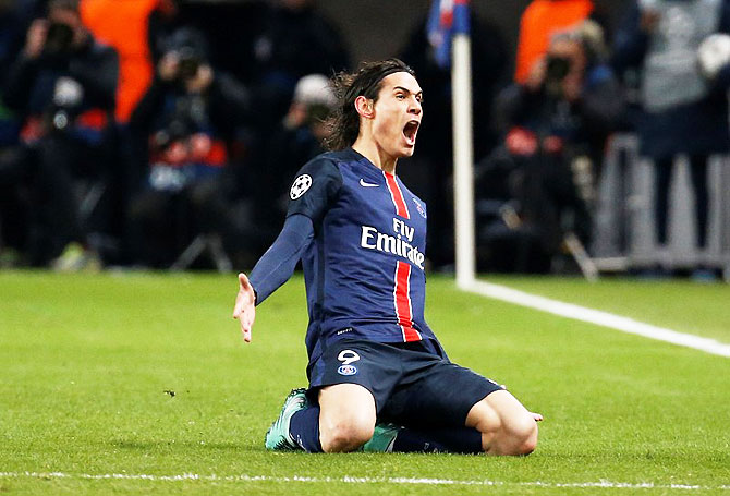 PSG's Edinson Cavani celebrates scoring the winning goal for Paris St Germain during their Champions League round of 16, first leg match at the Parc des Princes stadium in Paris on Tuesday