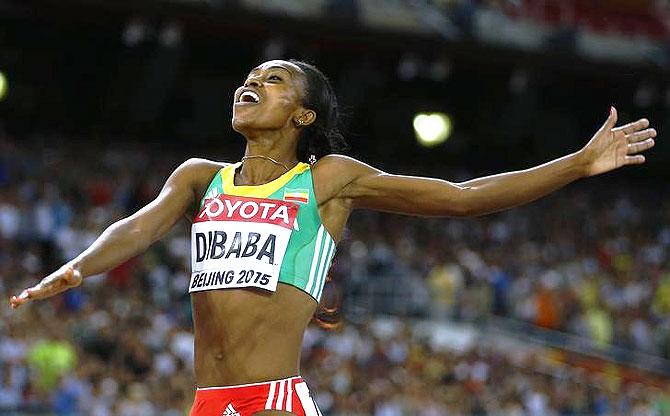 Genzebe Dibaba of Ethiopia celebrates 