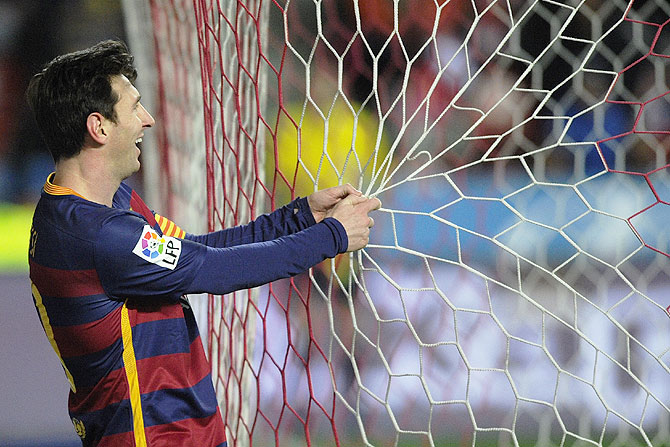 Barcelona's Lionel Messi reacts during the match