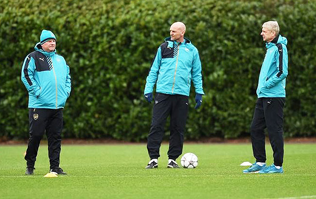 Arsenal manager Arsene Wenger, assistant manager Steve Bould and first team coach Neil Banfield during training at the Arsenal Training Ground in London on Monday