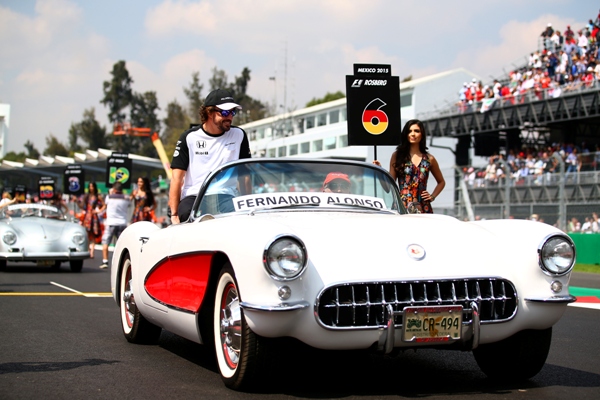 Fernando Alonso of Spain takes part in the drivers' parade in Mexico City 