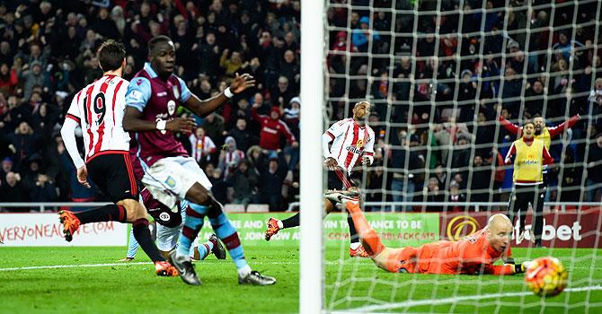 Sunderland striker Jermaine Defoe wheels away after scoring the second goal against Aston Villa at Stadium of Light in Sunderland