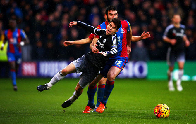 Chelsea's Oscar is fouled by Crystal Palace's Mile Jedinak