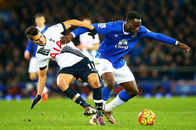 Everton's Romelu Lukaku holds off Tottenham Hotspur's Erik Lamela during their Barclays English Premier League match at Goodison Park in Liverpool on Sunday