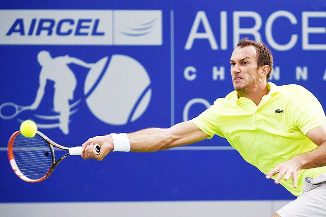 Ante Pavic of Croatia in action against Nicolas Almagro of Spain during the first round match for the ATP Chennai Open 2016 at SDAT Tennis Stadium in Chennai on Monday