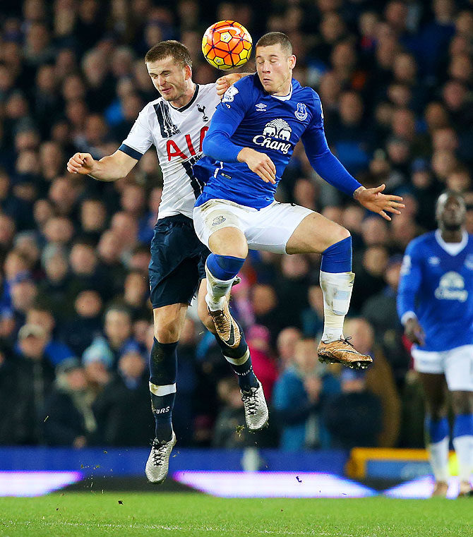 Everton's Ross Barkley and Tottenham Hotspur's Eric Dier are involved in an aeriel challenge