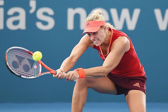 Germany's Angelique Kerber plays a backhand against Italy's Camila Giorgi