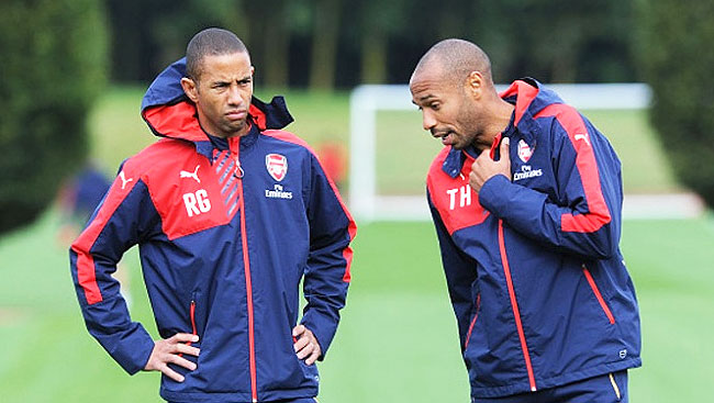 Arsenal's Under-19 assistant coach Thierry Henry with under-19 coach Ryan Garry during a training session