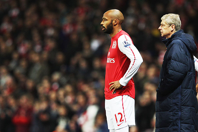 Arsenal's Thierry Henry and coach Arsene Wenger