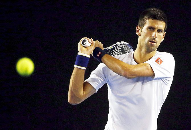 Serbia's Novak Djokovic hits a shot during a practice session at Melbourne Park on Wednesday