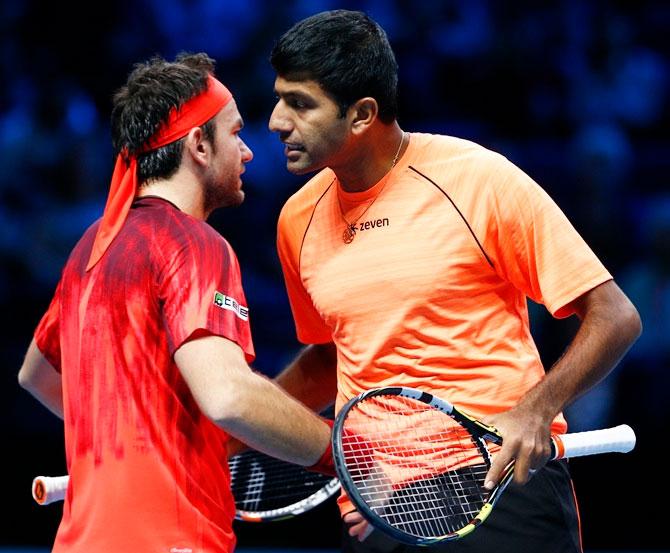  Romania's Florin Mergea, left, celebrates with India's Rohan Bopanna