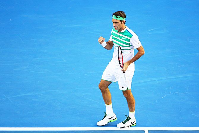 Switzerland's Roger Federer reacts in his first round match against Georgia's Nikoloz Basilashvili at the Australian Open in Melbourne Park on Monday