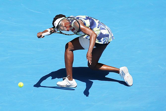 The United States' Venus Williams plays a forehand against Great Britain's Johanna Konta in her first round match of the 2016 Australian Open at Melbourne Park on Tuesday