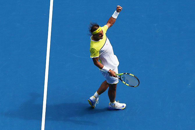 Rafael Nadal celebrates on winning the second set
