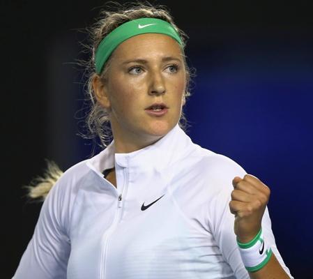 Victoria Azarenka of Belarus celebrates during her first round match against Alison Van Uytvanck of Belgium 