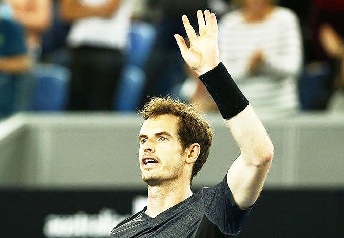 Britain's Andy Murray celebrates after winning his third round match against Portugal's Joao Sousa at the Australian Open tennis tournament at Melbourne Park on Saturday