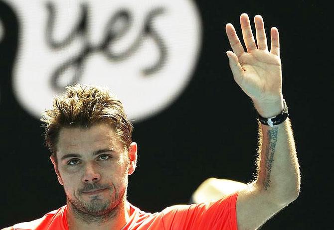 Switzerland's Stan Wawrinka celebrates after winning his third round match against Czech Republic's Lukas Rosol at the Australian Open tennis tournament at Melbourne Park on Saturday