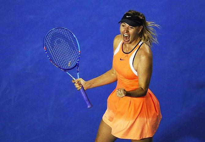 Russia's Maria Sharapova celebrates after winning her fourth round match against Switzerland's Belinda Bencic