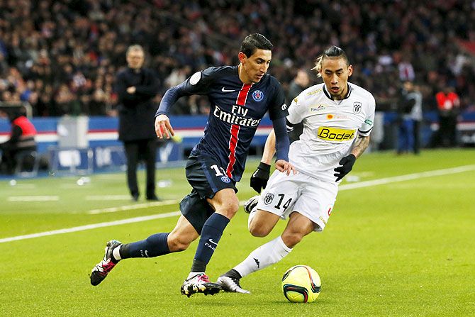 Paris St Germain's Angel Di Maria challenges Angers' Billy Ketkeophomphone as they vie for possession during their Ligue 1 match at the Parc des Princes stadium in Paris on Saturday