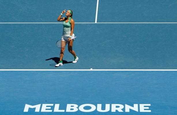 Belarus' Victoria Azarenka celebrates after winning her fourth round match against Czech Republic's Barbora Strycova at the Australian Open 