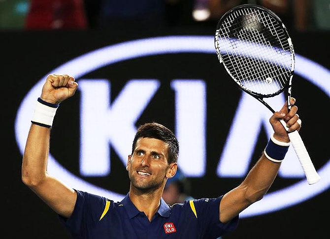 Serbia's Novak Djokovic celebrates after winning his quarter-final match against Japan's Kei Nishikori at the Australian Open at Melbourne Park on Tuesday