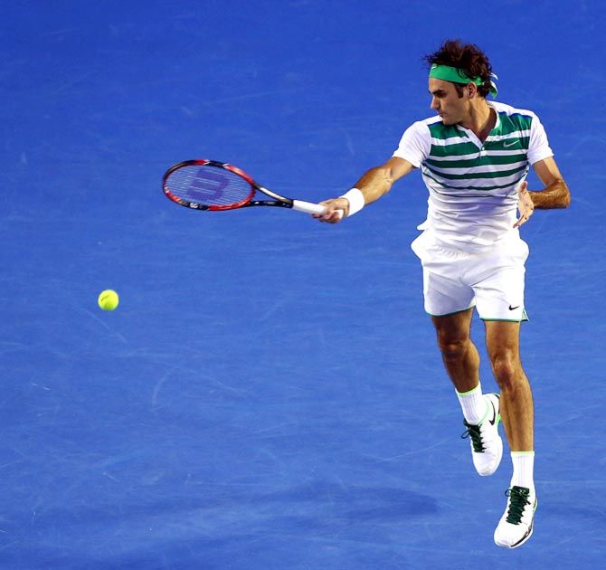 : Roger Federer in action. Photograph: Michael Dodge/Getty Images