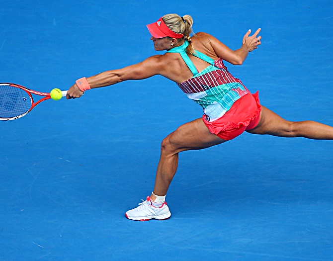 Germany's Angelique Kerber plays a backhand 