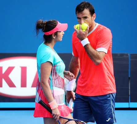 Sania Mirza of India and Ivan Dodig of Croatia during their mixed doubles match 