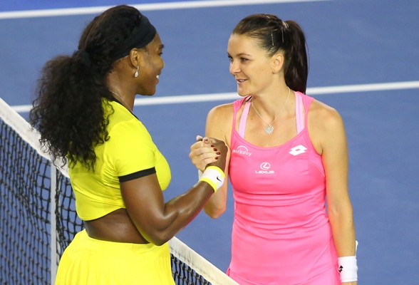 Agnieszka Radwanska of Poland congratulates Serena Williams of the United States 