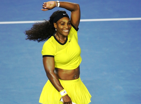 Serena Williams of the United States celebrates winning her semi-final against Agnieszka Radwanska of Poland 