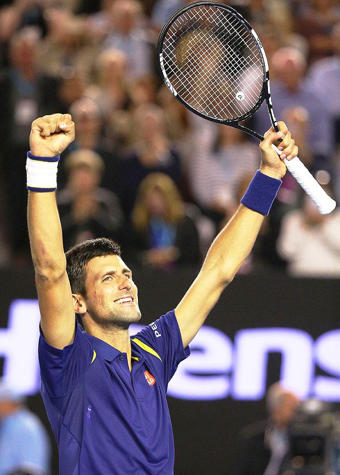 Serbia's Novak Djokovic hits a shot during his final match against Britain's Andy Murray at the Australian Open tennis tournament at Melbourne Park, on Sunday