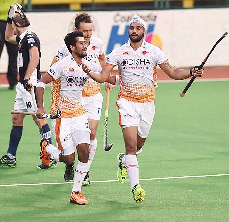 Kalinga Lancers players celebrate a goal against Dabang Mumbai during their Hockey India League match in Mumbai on Sunday