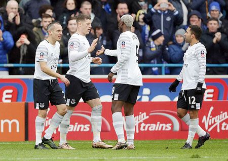 Everton's Ross Barkley (2nd from left) celebrates after he scores his sides third goal against Carlisle United during the Emirates FA Cup Fourth Round match at Brunton Park in Carlisle on Sunday