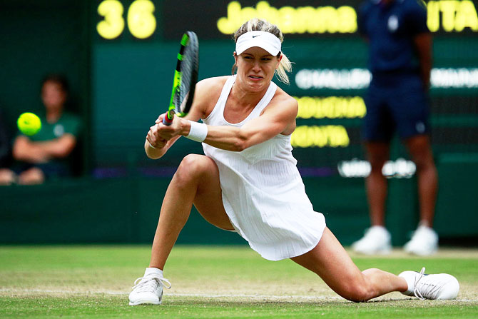 Canada's Eugenie Bouchard plays a backhand during her second round match against Great Britain's Johanna Konta on Thursday