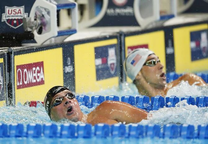 Michael Phelps (right) and Ryan Lochte react after the mens 200 meter individual medley final in the U.S. Olympic swimming team trials at CenturyLink Center in Omaha, Nebraska on Friday