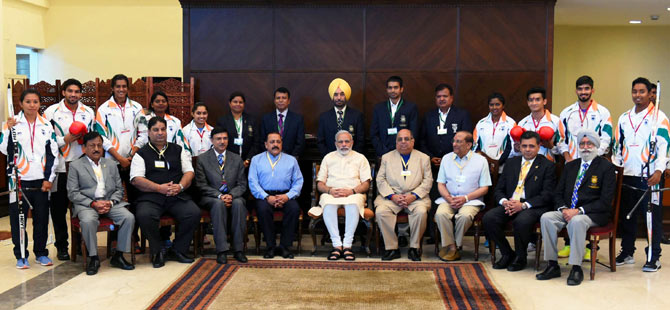 Prime Minister Narendra Modi along with Minister of State for Youth Affairs and Sports Jitendra Singh and the Indian Olympic Association officials pose for a picture with the Rio-bound Indian contingent on July 4, 2016