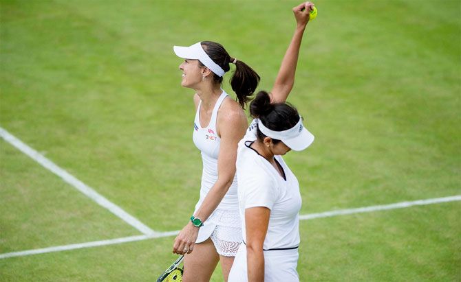 Martina Hingis and Sania Mirza celebrate their win